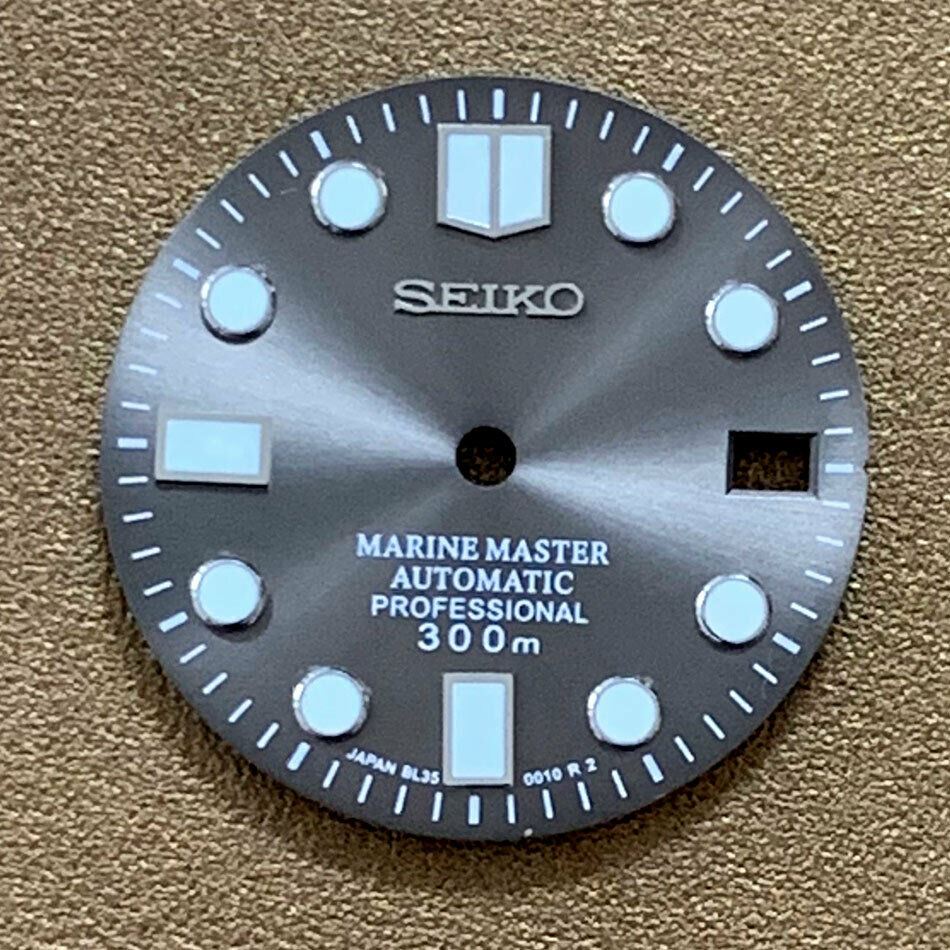 Green luminous 28.5mm Big Nail dial for NH35 movement by AE17, ideal for custom watch builds.