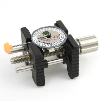 Bergeon 4039-P synthetic movement holder securing 3 3/4''-11'' watch movements for precise repair tasks.