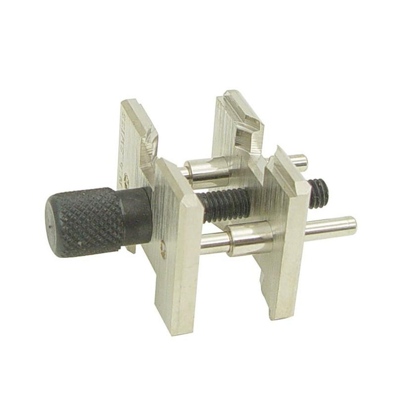 Bergeon 4039 reversible movement holder for secure watch repair and maintenance tasks.