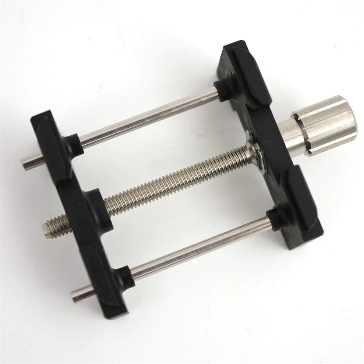 Bergeon 4040-P reversible watch movement holder securing watches for precise repairs.