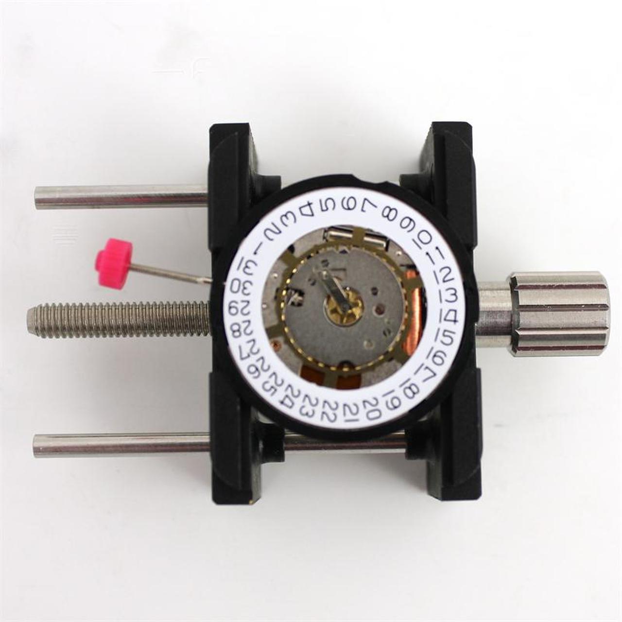 Bergeon 4040-P reversible watch movement holder showing secure adjustable repair support.