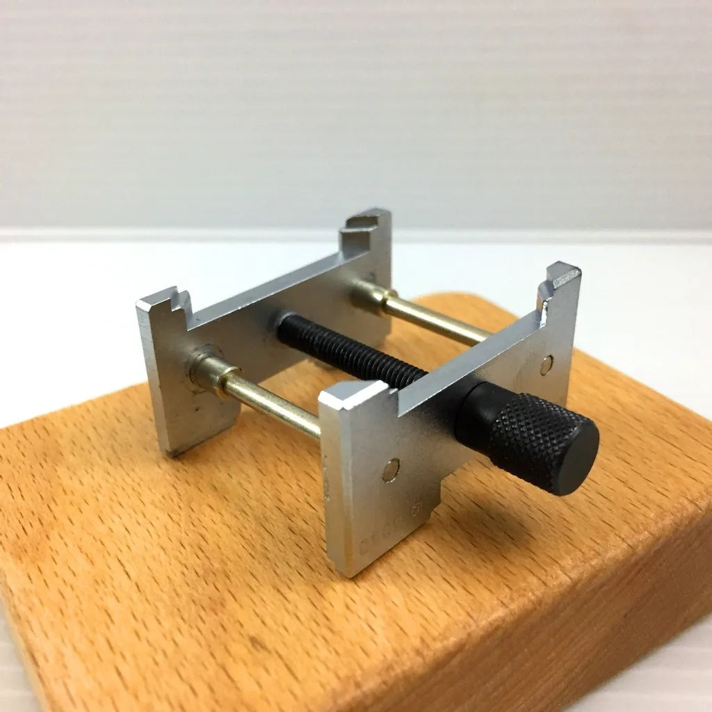 Bergeon 4040 reversible watch movement holder clamp, adjustable size for precise watch repair tasks