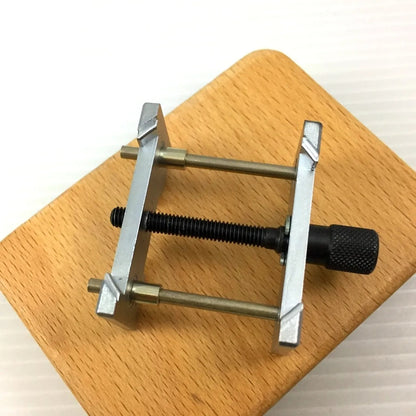 Bergeon 4040 adjustable reversible watch movement holder clamp, ideal for precise watch repair tasks