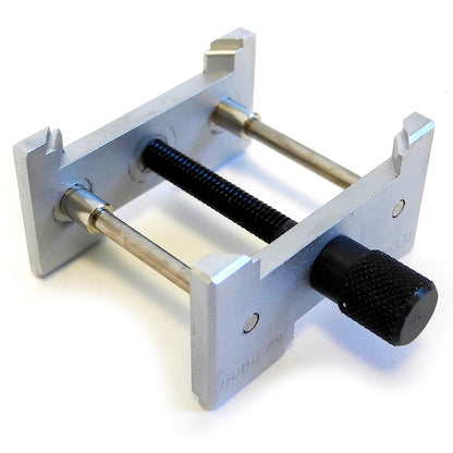 Bergeon 4040 reversible watch movement holder clamp, adjustable size, precision tool for watch repair.