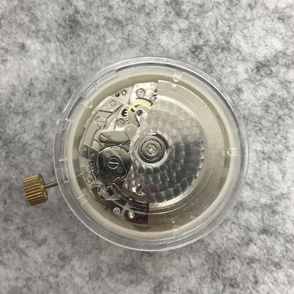 Close-up of Asian 7750 automatic chronograph movement with ETA 7753 layout featuring subdials at 3, 6, and 9 o?clock.