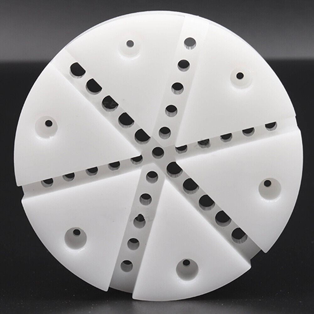 White watch band holder with strap pins remover tool for easy watch repair and bracelet adjustments.