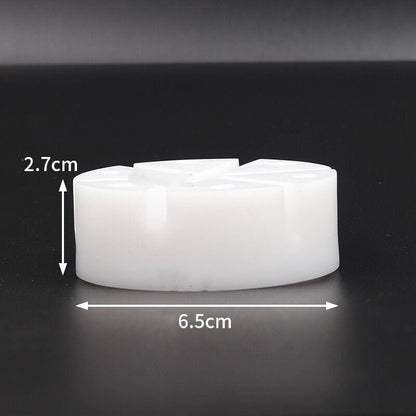 White watch band holder with strap pins remover tool for easy watch repair and bracelet adjustments.