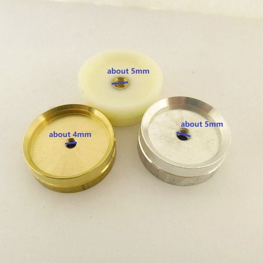 Set of 2 watch caseback press dies (21-47mm) for precise repairs, durable plastic and metal tools.