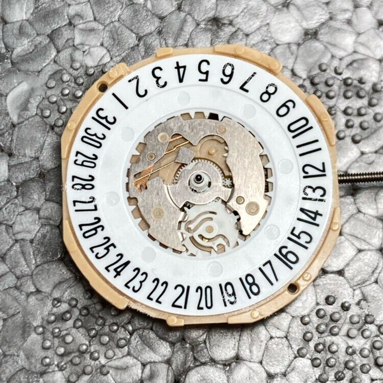 Sunon SP28 quartz watch movement with 3 hands and date display at 3/6, precise timekeeping accessory.