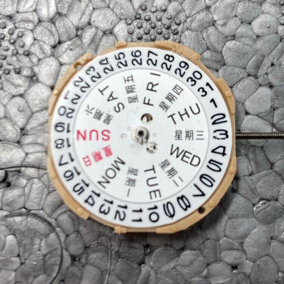 Sunon SP28 quartz watch movement with 3 hands, date and day display for precise timekeeping.