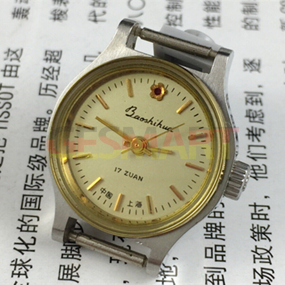 Elegant 23mm Shanghai Lady Watch with golden nail markers and round golden case, classic manual mechanical design.