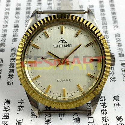 38mm TAIHANG manual mechanical watch with golden nail markers, silver round dial, and 17 jewels movement.