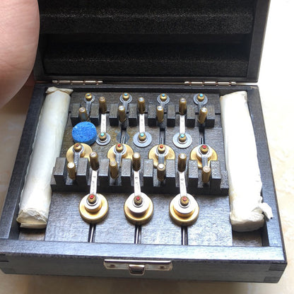 Bergeon 5355 mainspring winder set for precise watch spring replacement and repair tools.