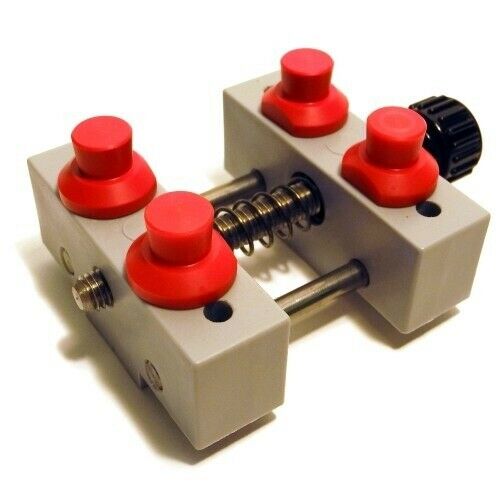 Bergeon 5685 waterproof watch case vice holder securing watches for precise repairs and maintenance.