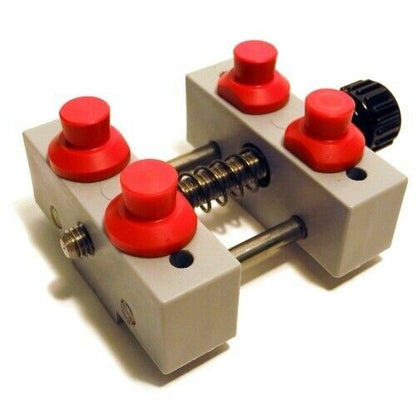 Bergeon 5685 waterproof watch case vice holder securing watches for precise repairs and maintenance.