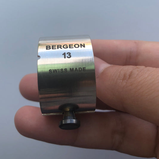 Ligne Bergeon 5914 reversible movement holder with knob, perfect for securely holding OMEGA 8500 watch movements during repairs.