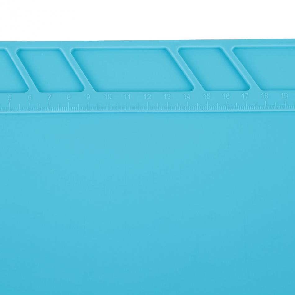 Heat-resistant 34cm x 23cm silicone soldering mat with non-slip surface for safe workstation.