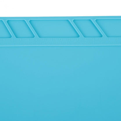 Heat-resistant 34cm x 23cm silicone soldering mat with non-slip surface for safe workstation.