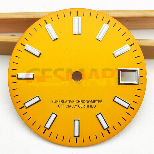 Green luminous metal watch dial with polished orange accents for NH35 movement, ideal for custom watch builds.