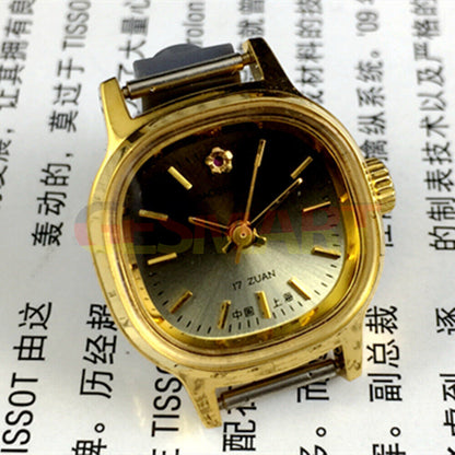 23mm Lady Watch with golden nails, gradient green dial, and square case, manual mechanical movement.
