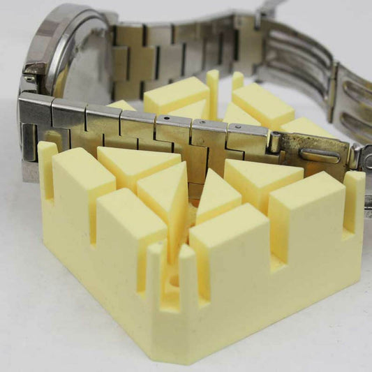 Bergeon 6744-P-S soft bracelet holder block for secure watch band repairs and adjustments.