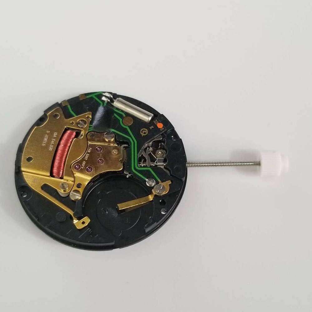 Quartz watch repair parts for ISA 330/103 and J320/103 movements, compatible replacement components.
