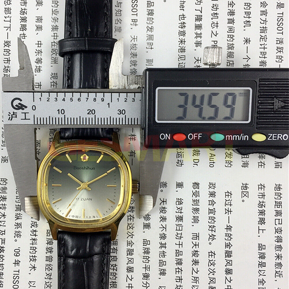 Shanghai 34mm manual mechanical watch with green dial and golden nail markers, 17 jewels, classic round case.