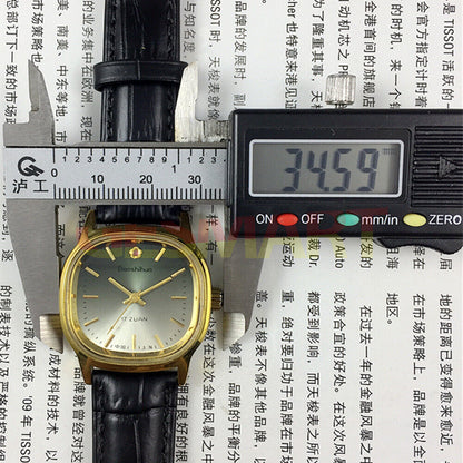 Shanghai 34mm manual mechanical watch with green dial and golden nail markers, 17 jewels, classic round case.