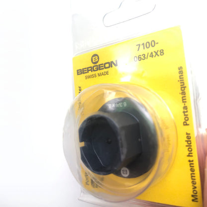 Bergeon 7100-063 watch movement holder gripping different sizes for precise repair and assembly.