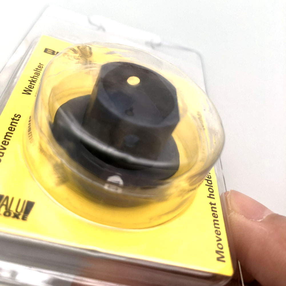 Bergeon 7100-063 watch movement holder for precise repair and assembly of multiple movement sizes.