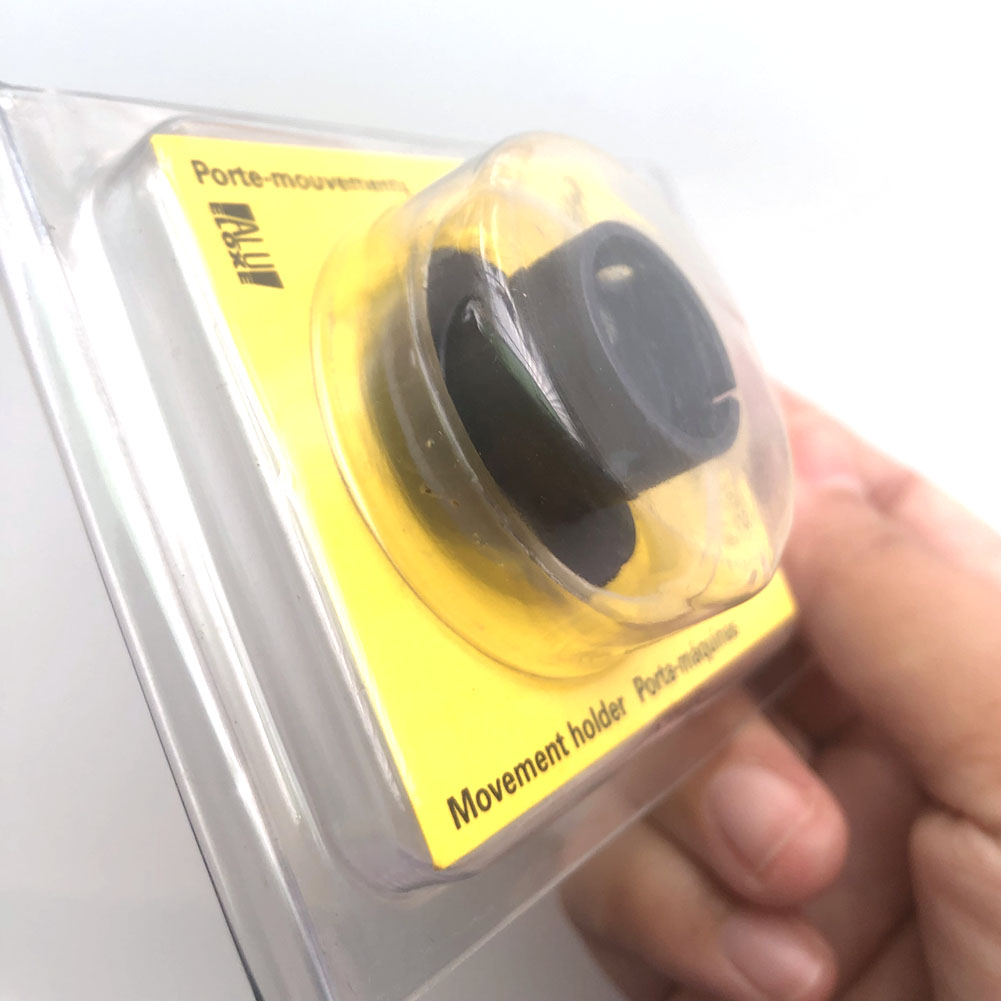 Bergeon 7100-07 watch movement holder securing standard watch parts for precise repair and assembly.