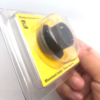 Bergeon 7100-07 watch movement holder securing standard watch parts for precise repair and assembly.