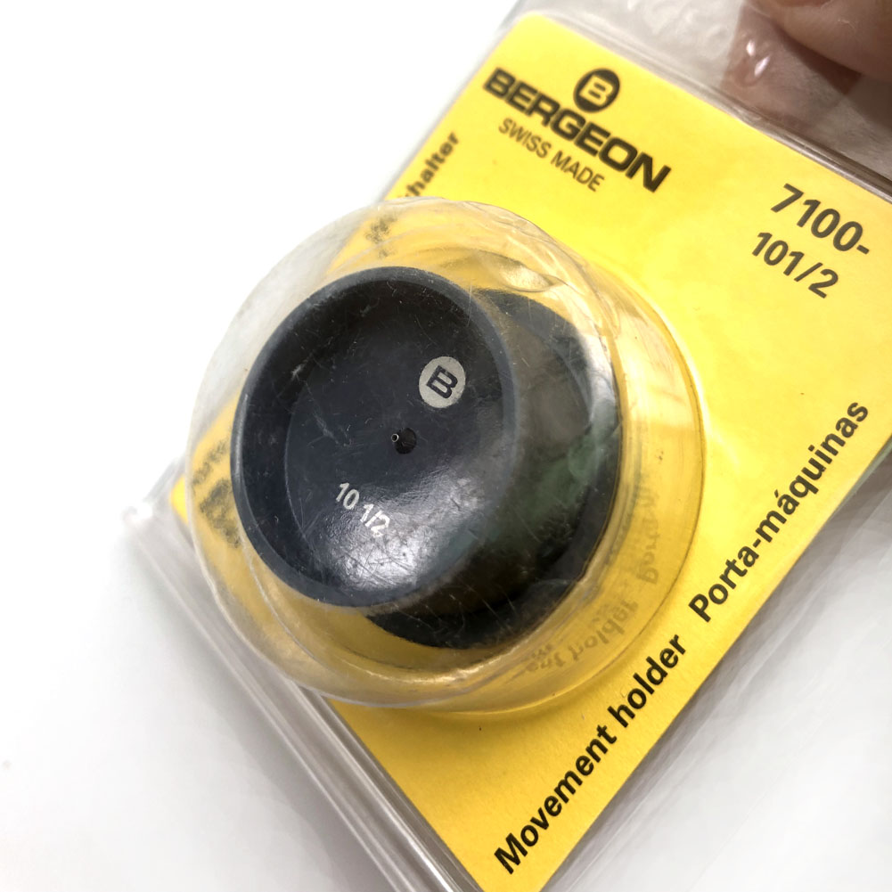 Bergeon 7100-10 1/2 watch movement holder for precise repair and assembly of watch movements.