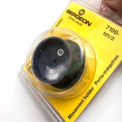 Bergeon 7100-10 watch movement holder securing standard movements for precise repair and assembly.