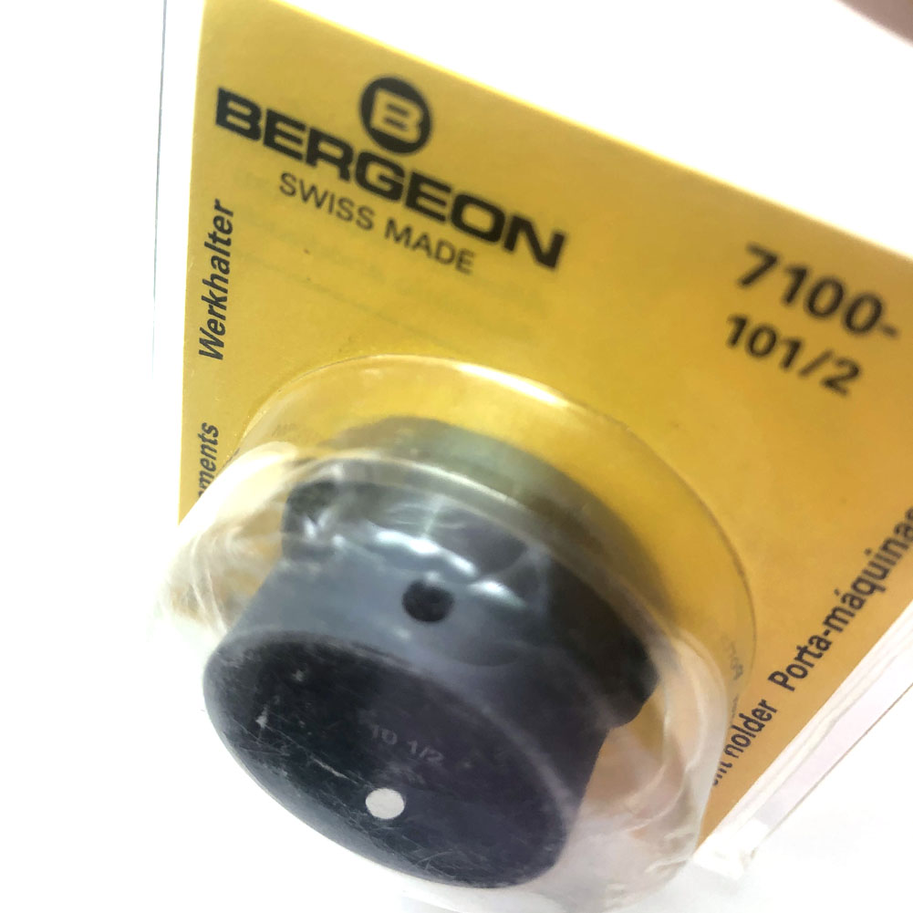 Bergeon 7100-10 watch movement holder securing standard movements for precise watch repair and assembly.