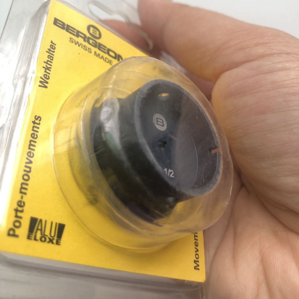 Bergeon 7100-10 1/2 watch movement holder for secure and stable watch repair and assembly.