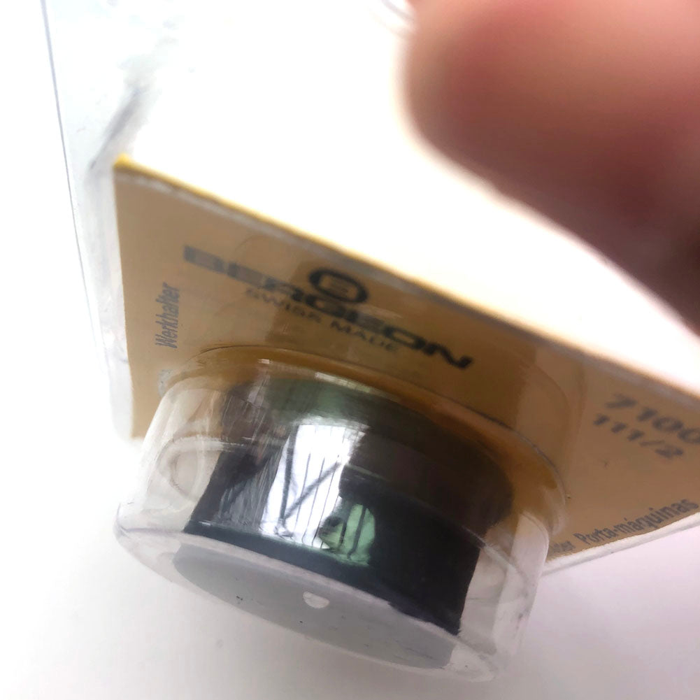 Bergeon 7100-11 1/2 watch movement holder securely supports movements for precise watch repair and assembly.