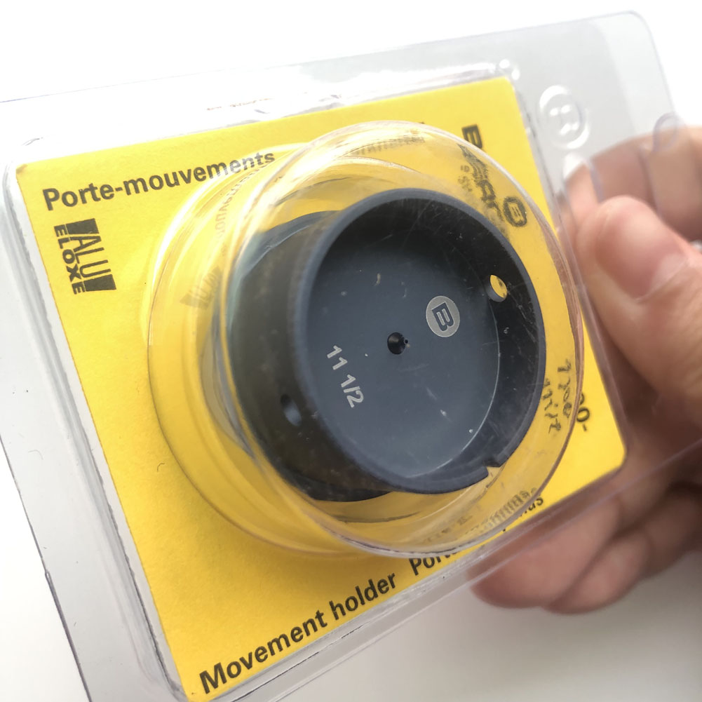 Bergeon 7100-11 watch movement holder for secure and precise watch repair and assembly tasks.