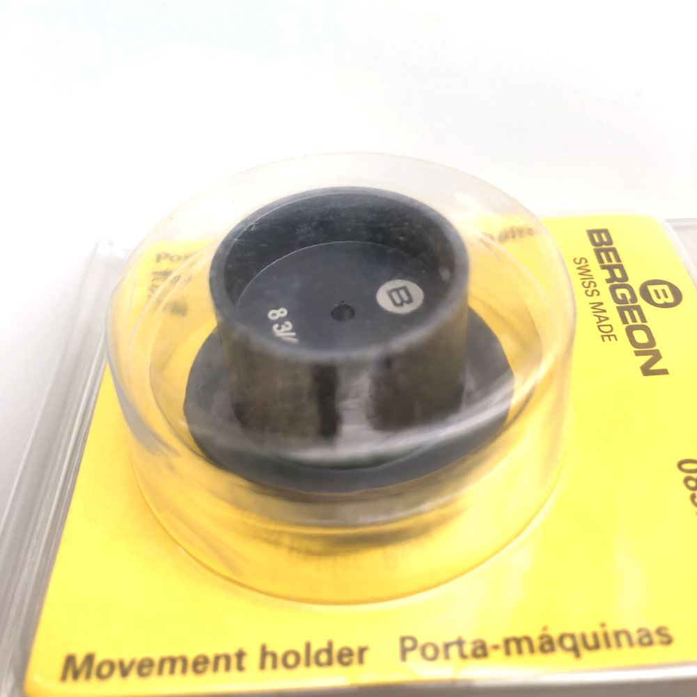 Bergeon 7100-08 watch movement holder with clamp, securing standard size movements for accurate repair and maintenance.