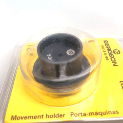 Bergeon 7100-08 watch movement holder with clamp, securing standard size movements for accurate repair and maintenance.