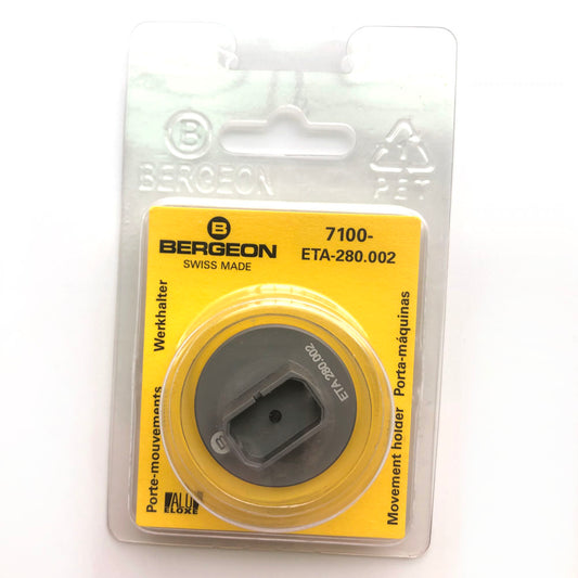 Bergeon 7100 watch movement holder securing ETA 280.002 for precise repair and maintenance.