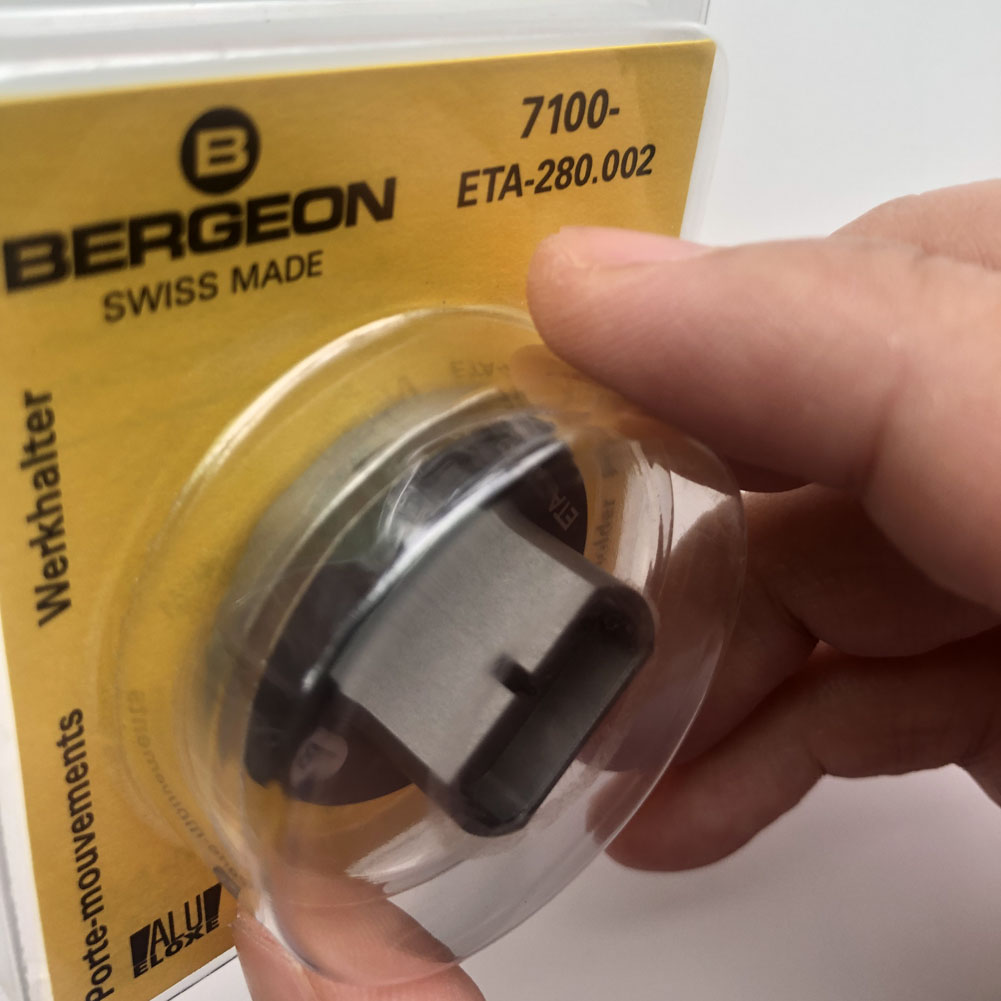 Bergeon 7100 watch movement holder securing ETA 280.002 for precise watch repairs and maintenance.