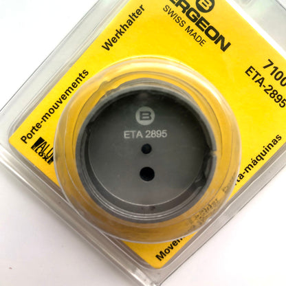Bergeon 7100 watch movement holder for ETA 2895, precision tool for expert watch repairs and maintenance.