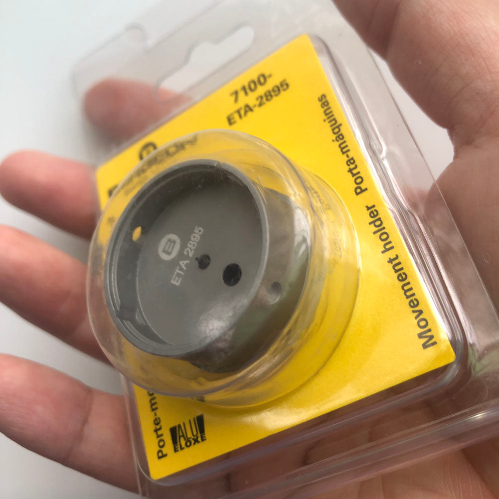 Bergeon 7100 watch movement holder for ETA 2895, ensuring stable support during precise repairs.