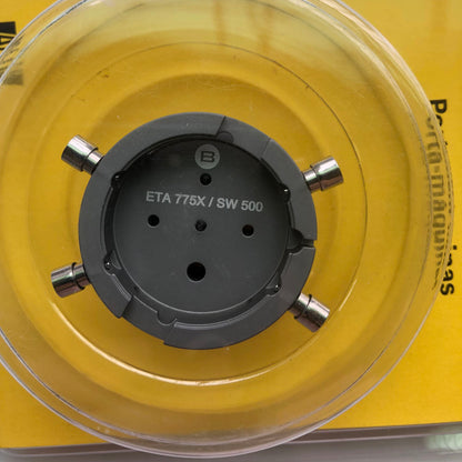 Bergeon 7100 watch movement holder securing ETA 775X Valjoux, durable repair tool for watchmakers.