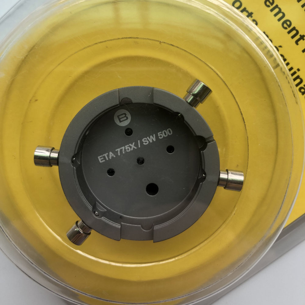 Bergeon 7100 watch movement holder securing ETA 775X Valjoux, durable tool for precise watch repair tasks.