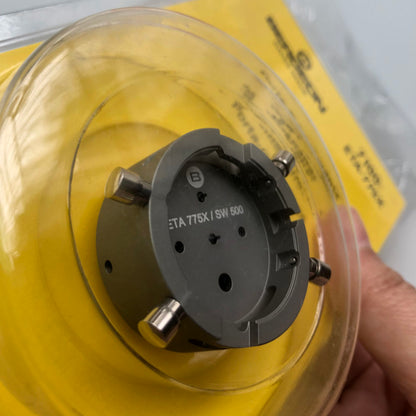 Bergeon 7100 watch movement holder securing ETA 775X Valjoux, durable repair tool for precision maintenance.