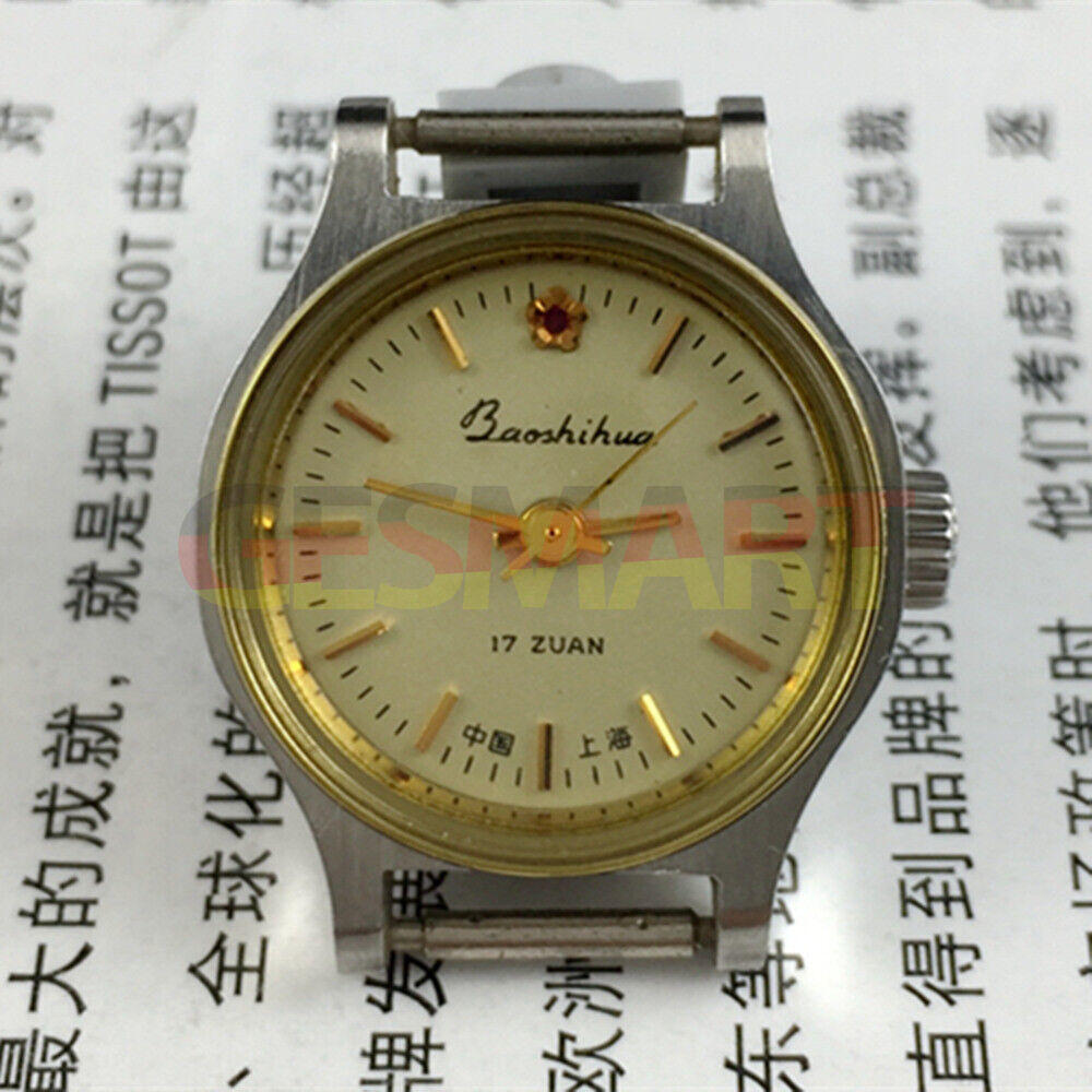 Elegant 23mm Shanghai Lady Watch featuring golden nail markers, round gold case, and classic manual mechanical movement.