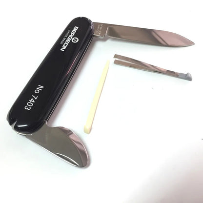 Bergeon 7403 Victorinox ergonomic watch case back opener knife for precise watch repair.