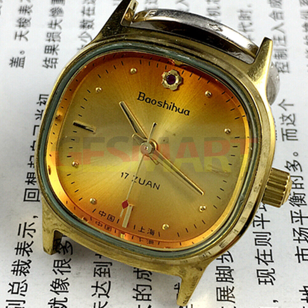 Shanghai 33mm manual mechanical watch with vibrant orange dial and golden nail markers in a square case, 17 jewels.